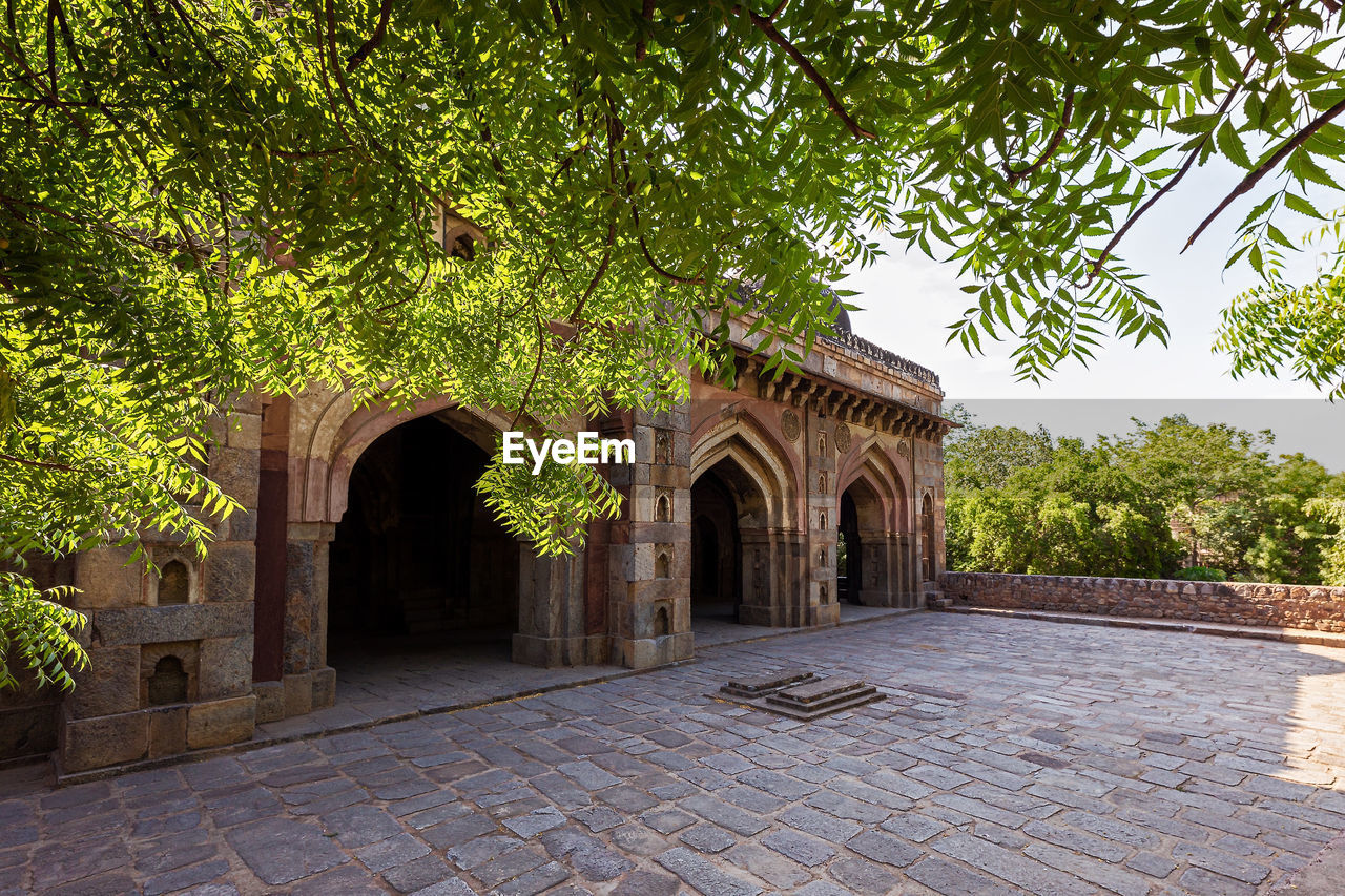 Entrance of historic building against sky