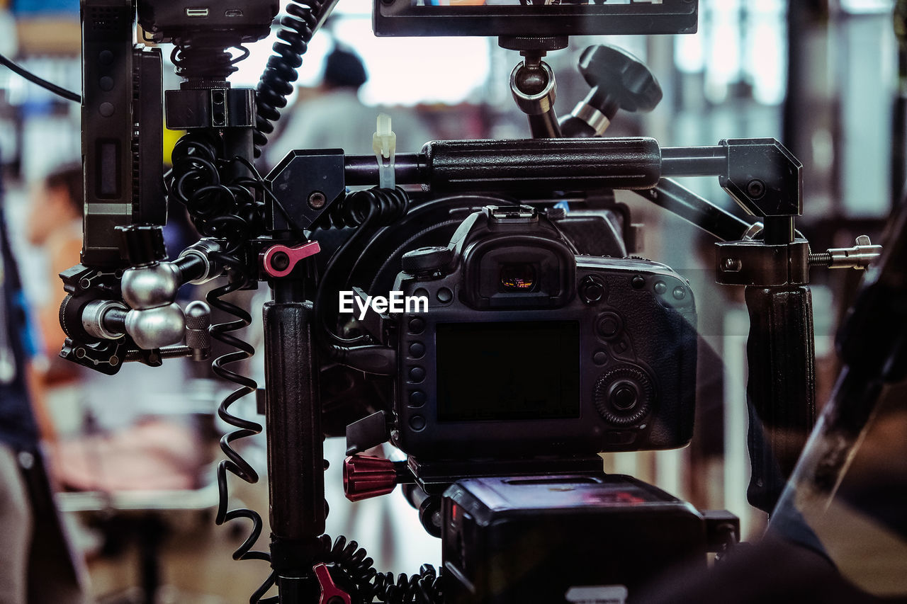 CLOSE-UP OF CAMERA IN MACHINE