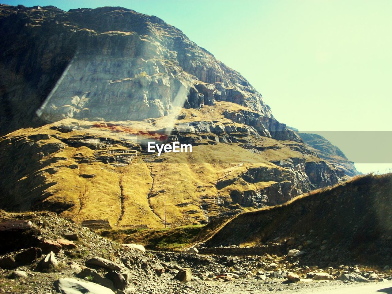 SCENIC VIEW OF MOUNTAIN AGAINST CLEAR SKY