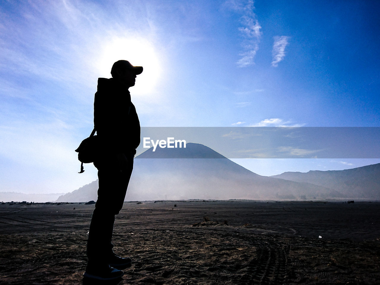 Silhouette of man standing on land