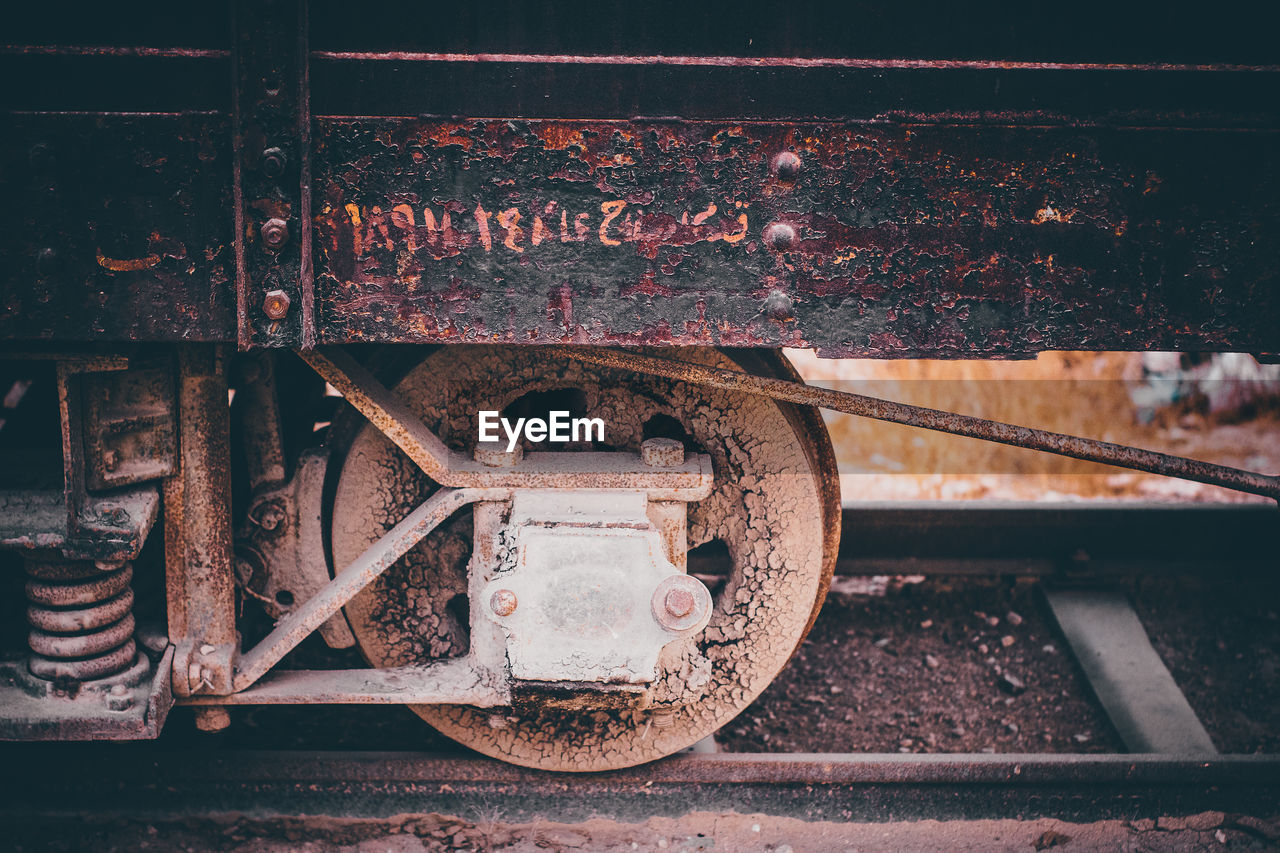Close-up of abandoned train on railroad track