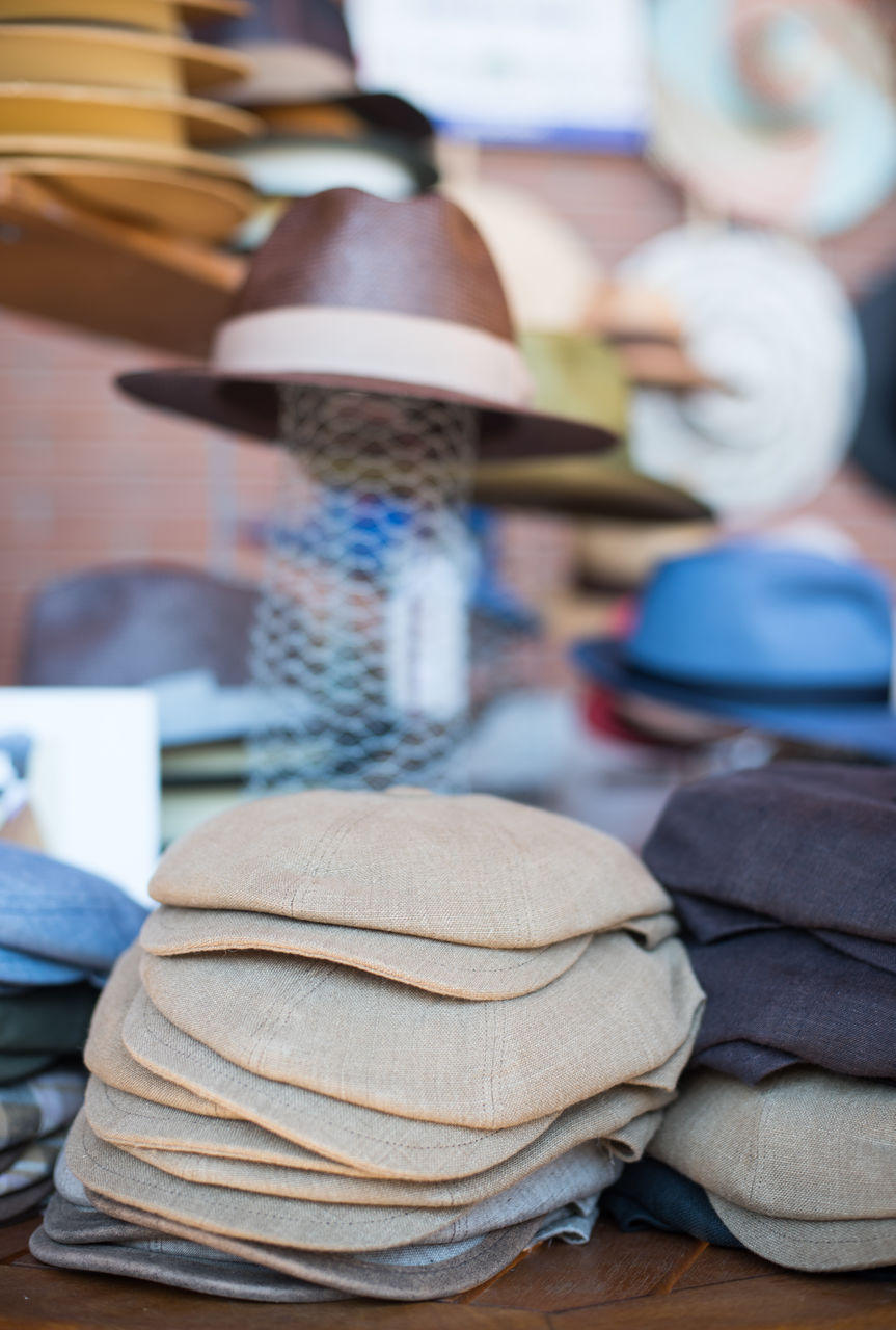 Close-up of flat caps in store for sale