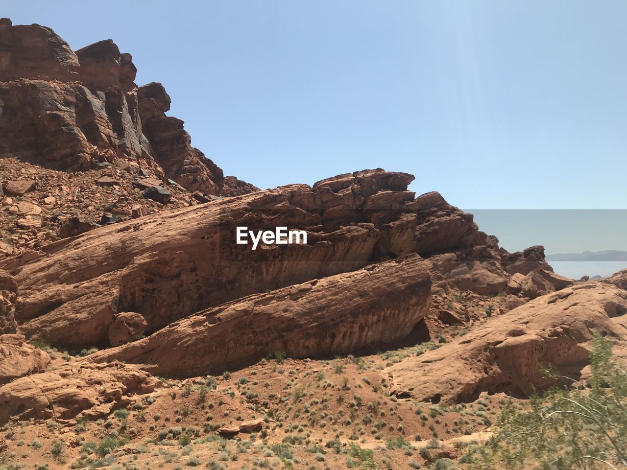 Scenic view of rocky mountains against clear sky