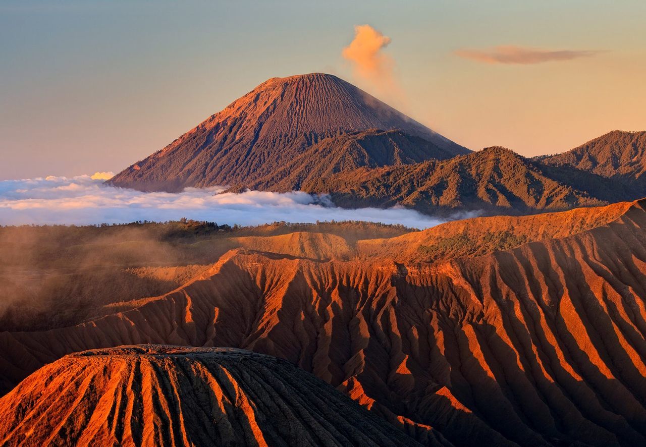 Landscape with mountain range in background