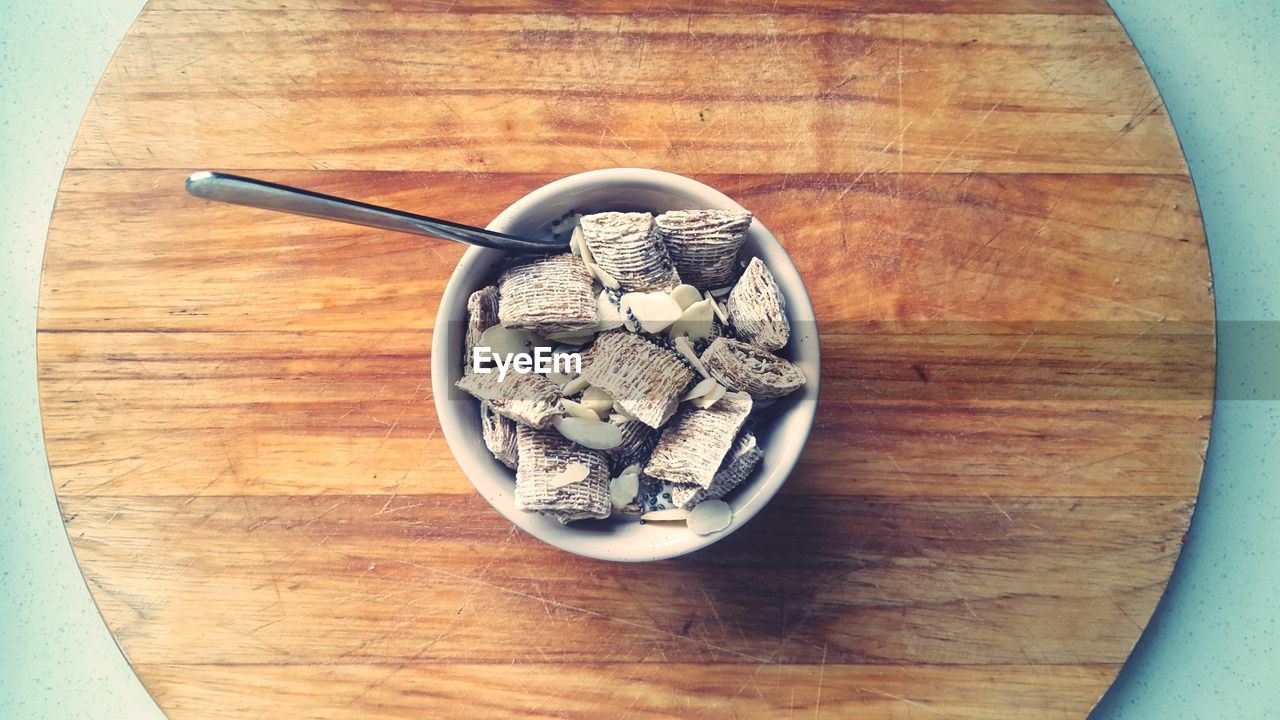 Close-up of food in bowl on cutting board