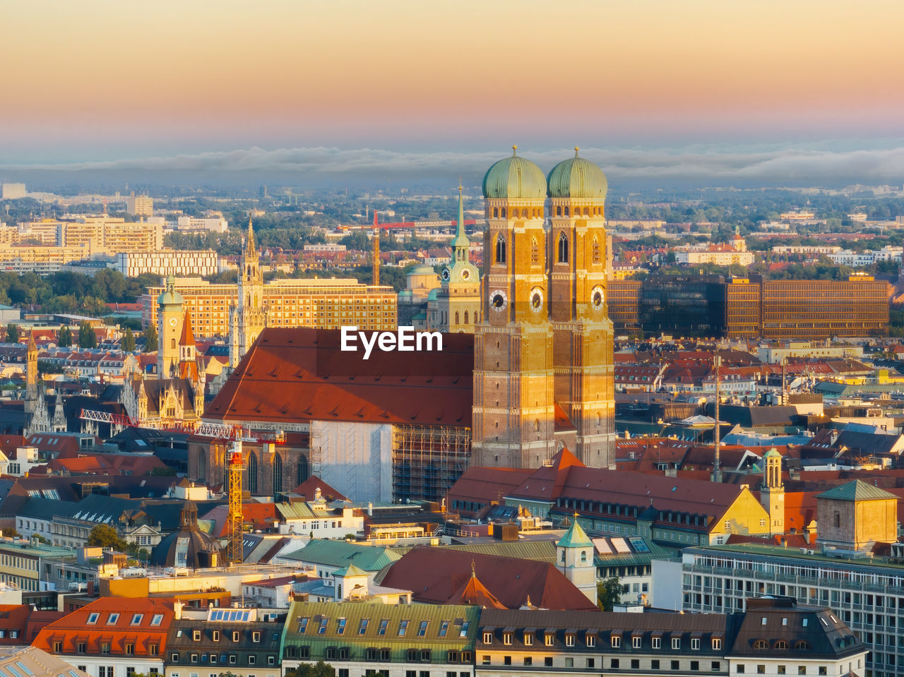 architecture, building exterior, built structure, city, skyline, cityscape, building, travel destinations, landmark, sky, place of worship, nature, high angle view, religion, travel, sunset, urban area, landscape, tower, town, residential district, dome, downtown, roof, urban skyline, horizon, evening, tourism, metropolis, no people, dusk, belief, history, aerial view, the past, city life, outdoors, skyscraper, worship, spirituality, metropolitan area, transportation, twilight