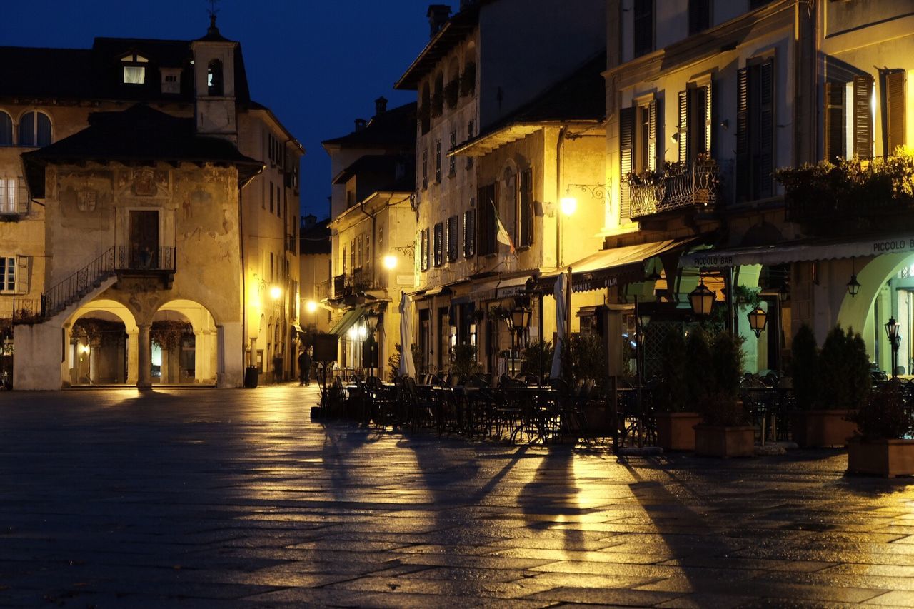 Illuminated buildings in town at night