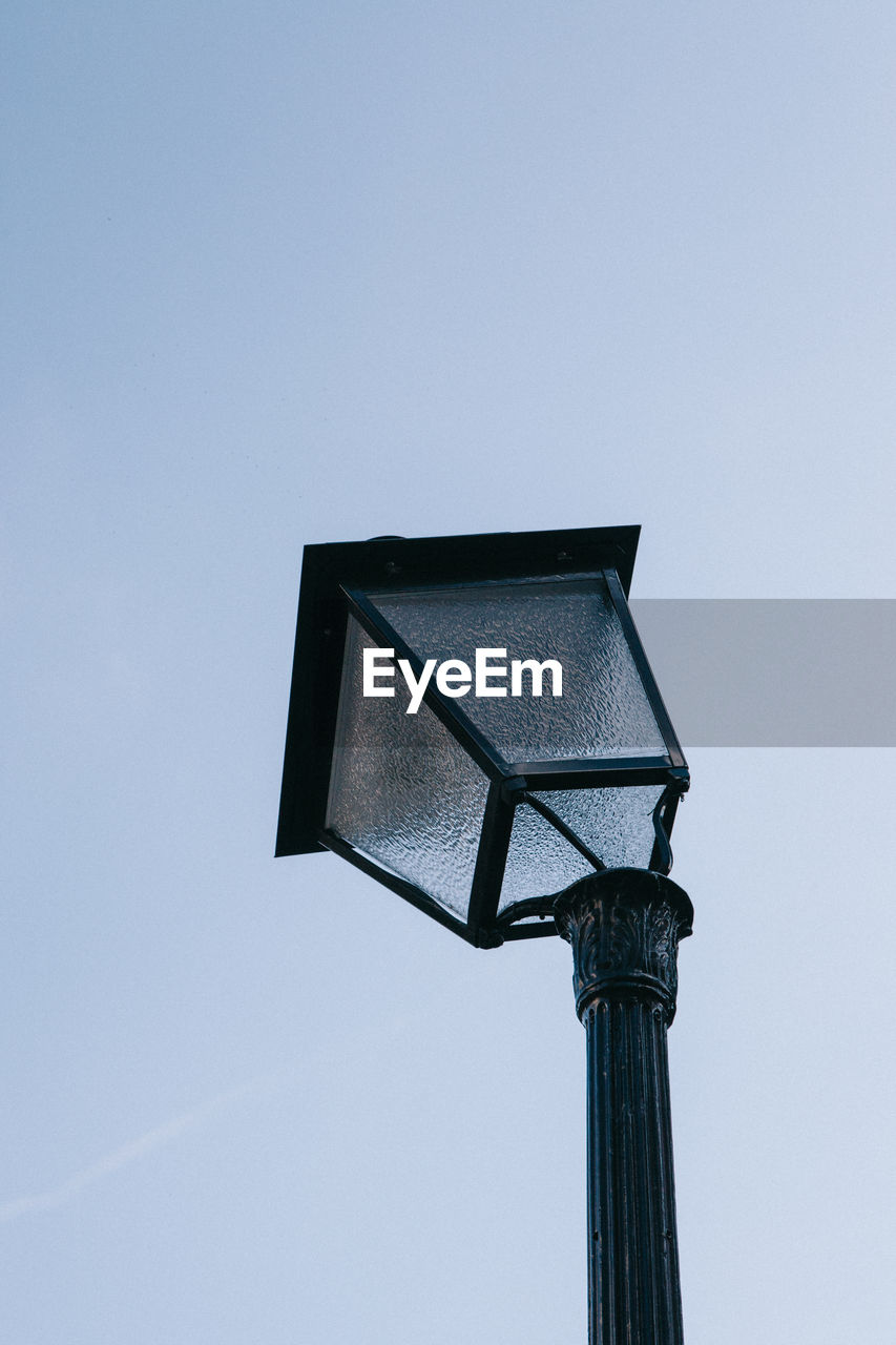 Low angle view of street light against clear sky