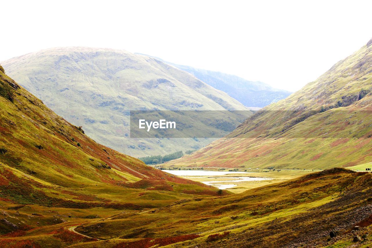 Scenic view of mountains against clear sky