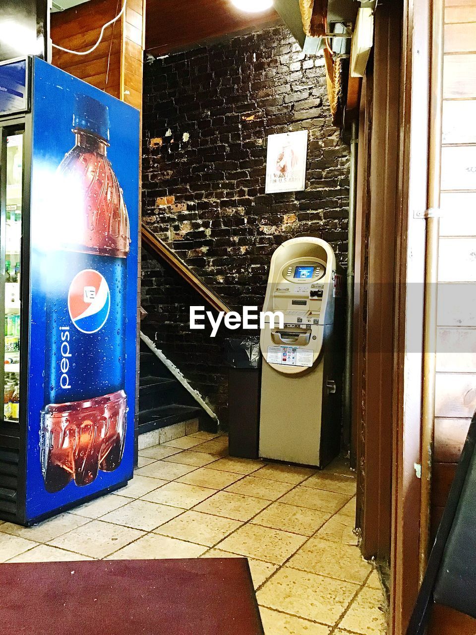 TEXT ON GLASS DOOR OF BUILDING