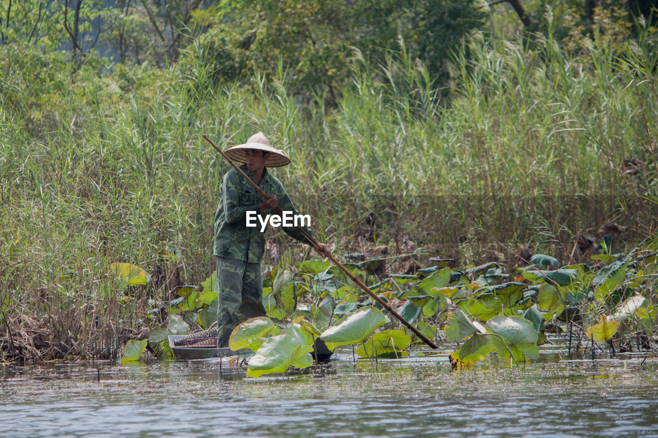 PEOPLE WORKING IN WATER