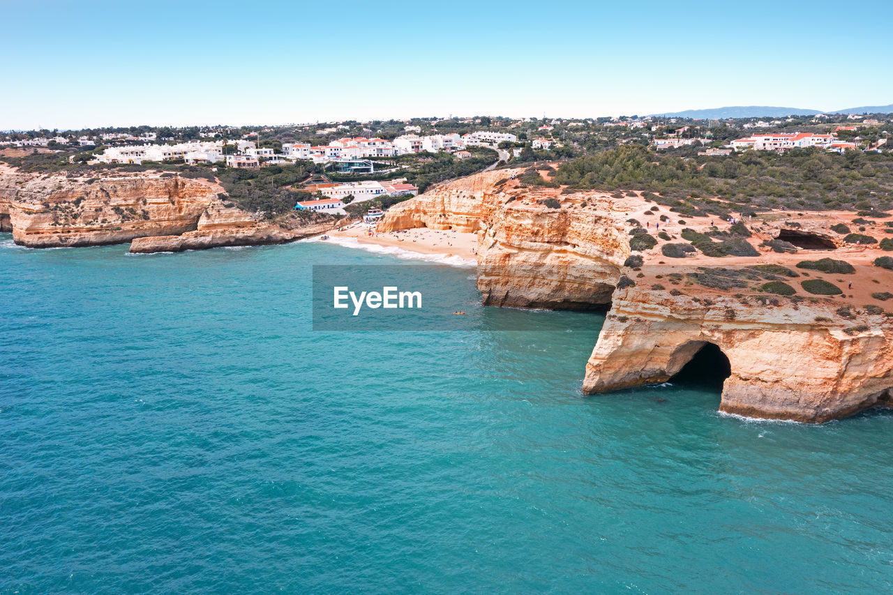 Aerial from the rocky south coast at benagil in the algarve portugal