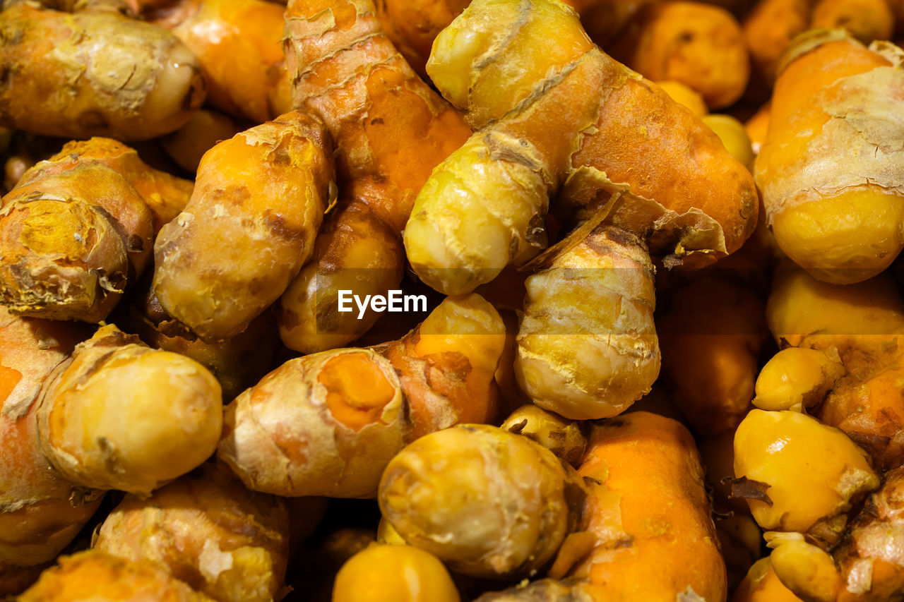 Raw turmeric vegetables at vegetable store for sale at evening