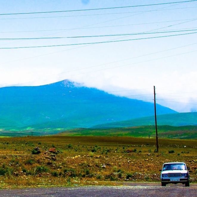 ROAD PASSING THROUGH LANDSCAPE