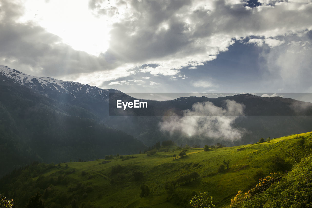 Scenic view of mountains against sky