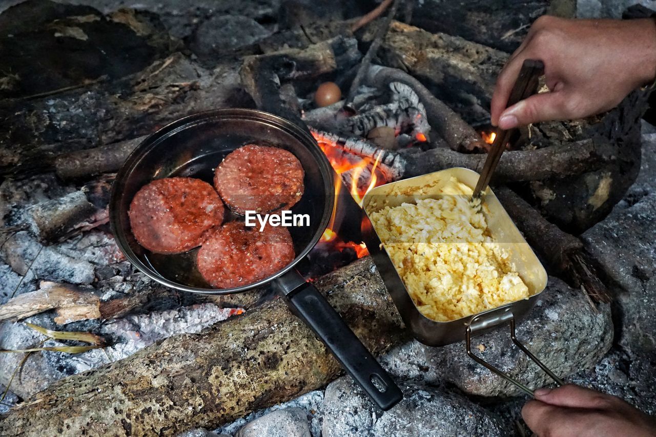 Midsection of man preparing food