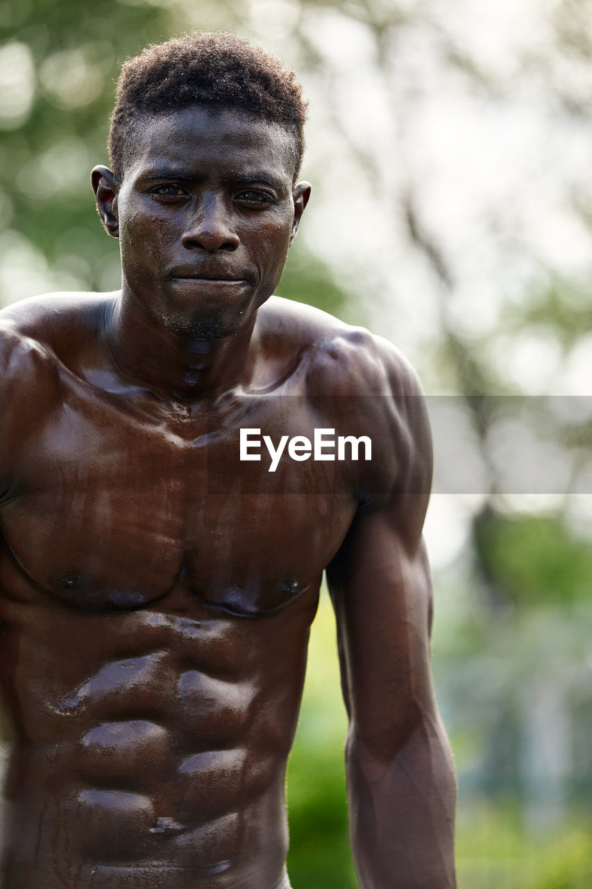 Portrait of shirtless young man