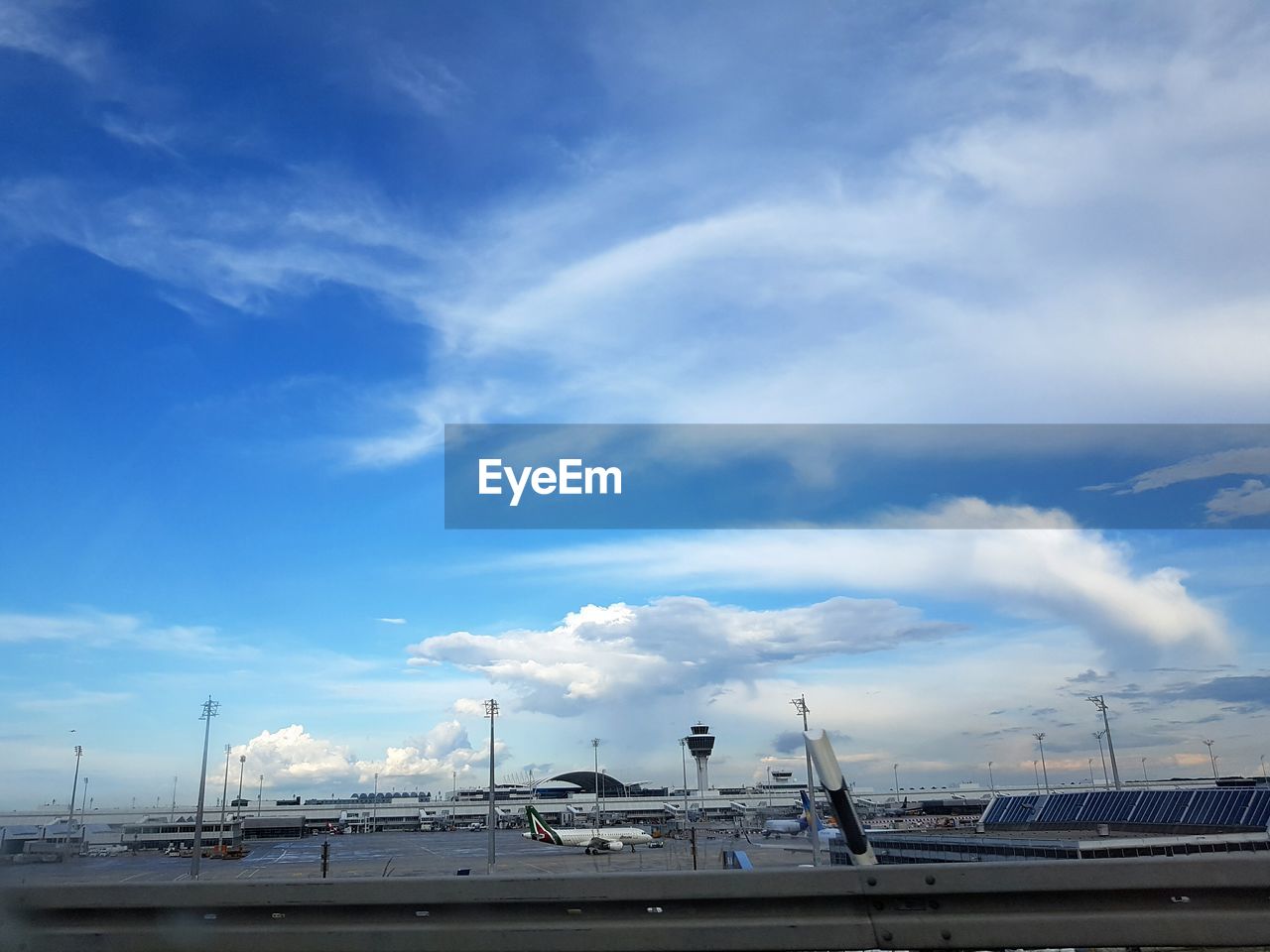 Airport runway against sky