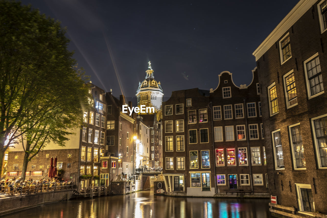 ILLUMINATED BUILDINGS AT NIGHT