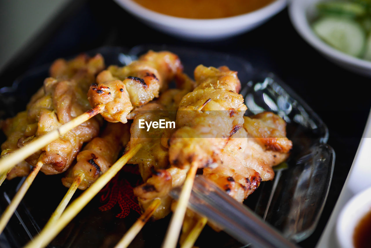 CLOSE-UP OF MEAL SERVED ON BARBECUE