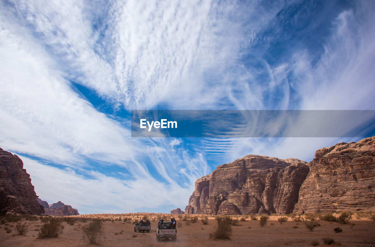 Panoramic view of rocks and mountains against sky