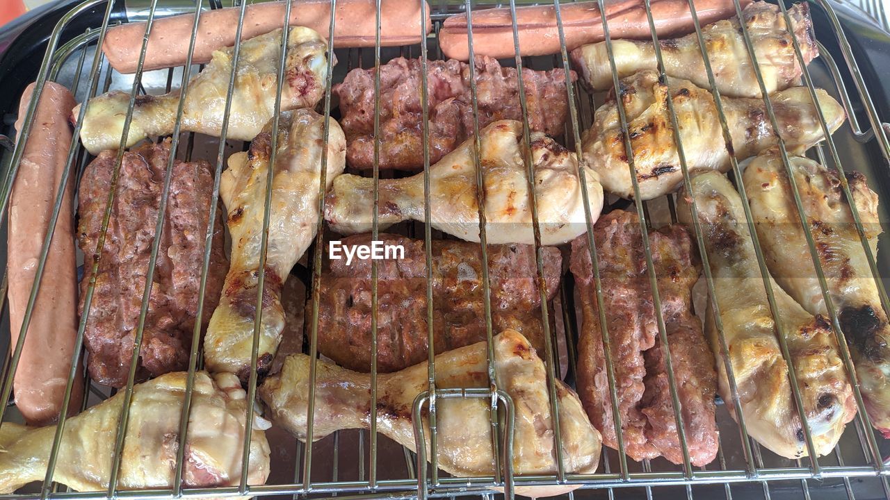 HIGH ANGLE VIEW OF MEAT FOR SALE AT MARKET