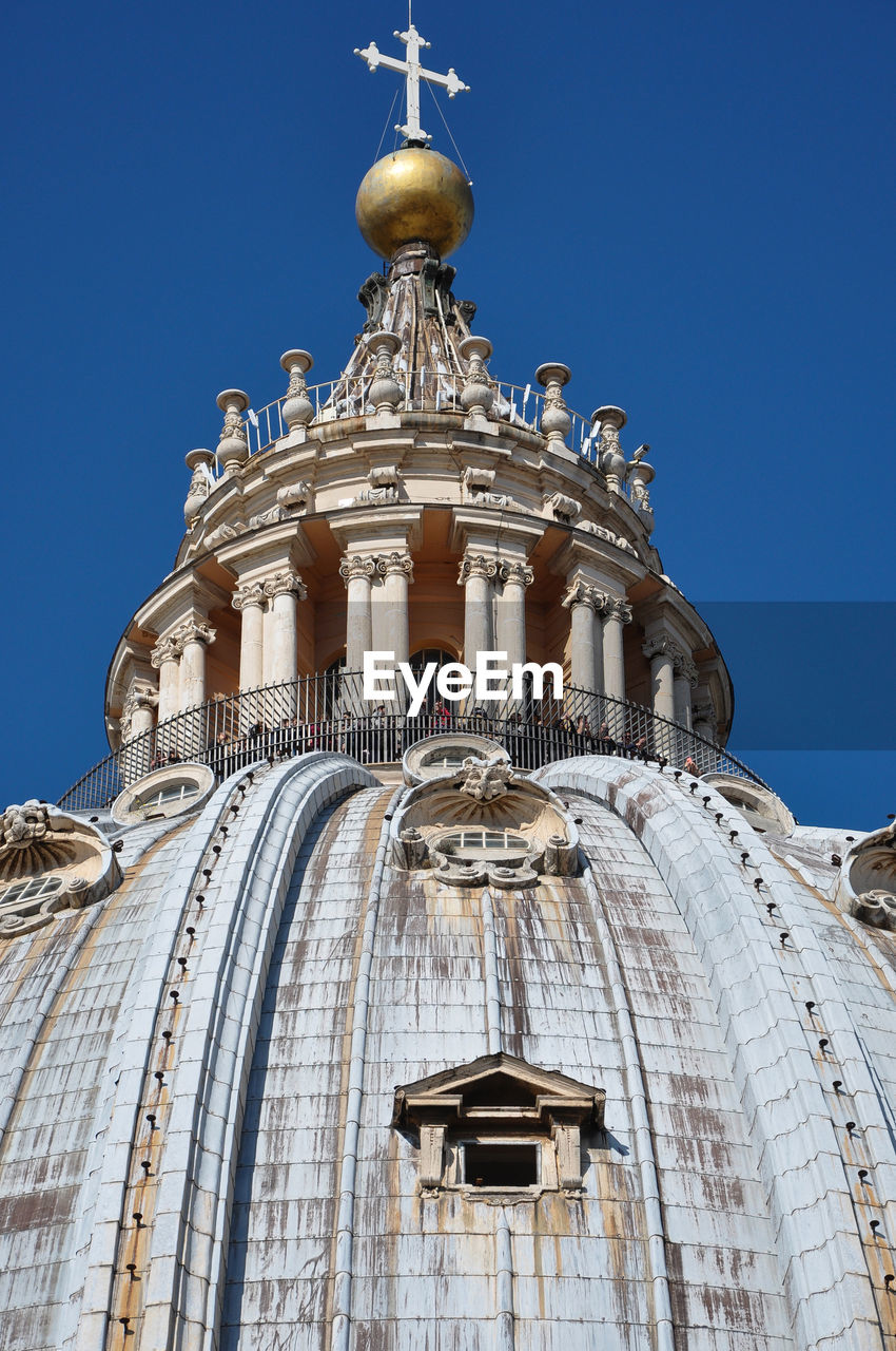 Tourists visiting the cupola of the saint peter's basilica in vatican city 