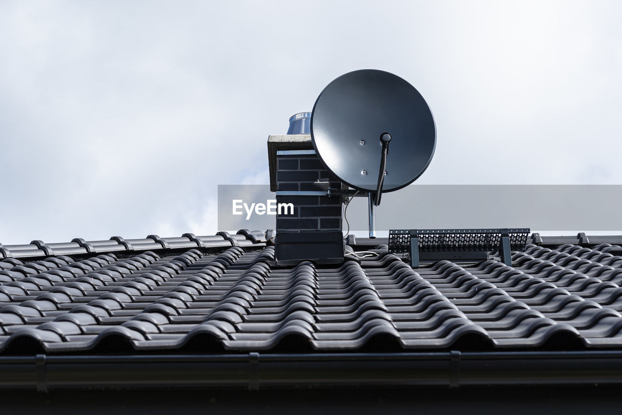 Graphite satellite dish mounted to the chimney with the chimney holder.