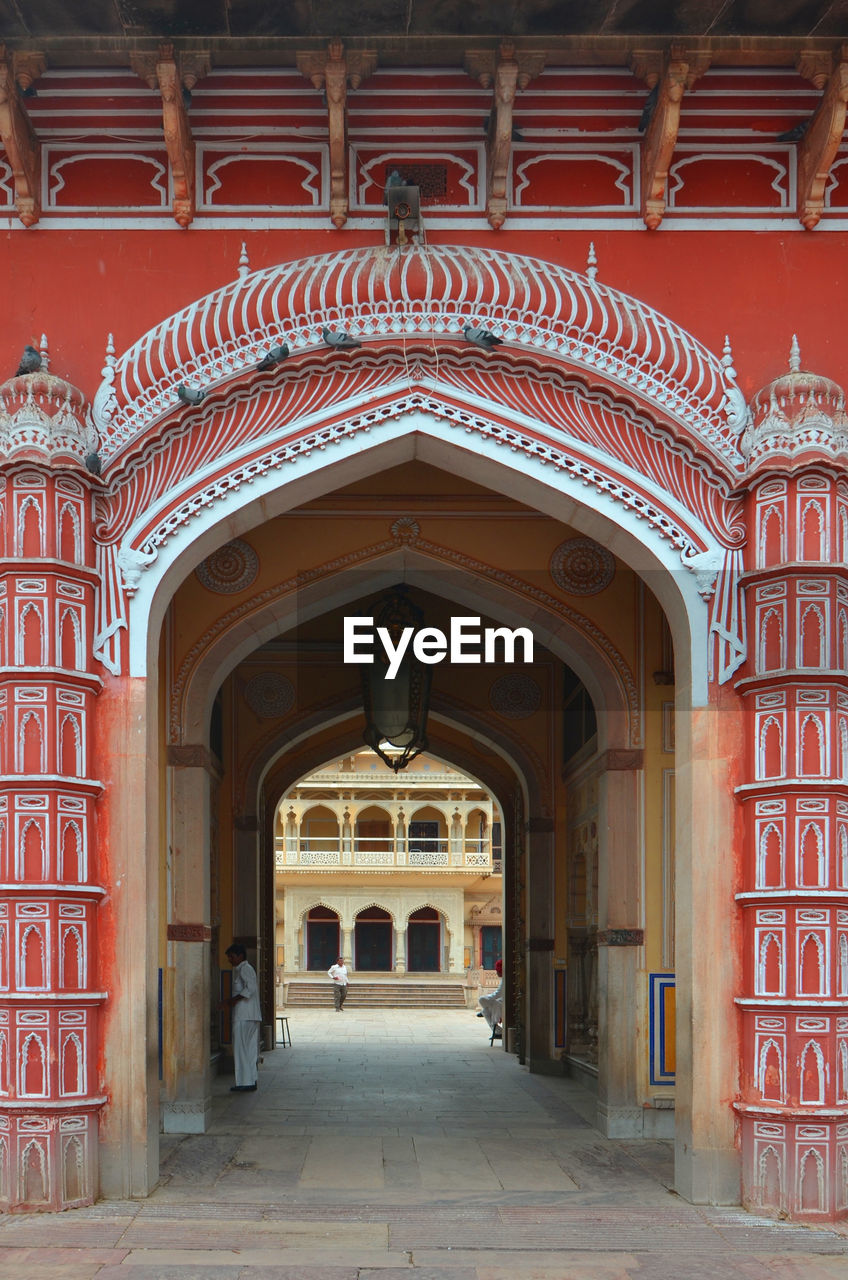 Historic archway leading towards fort