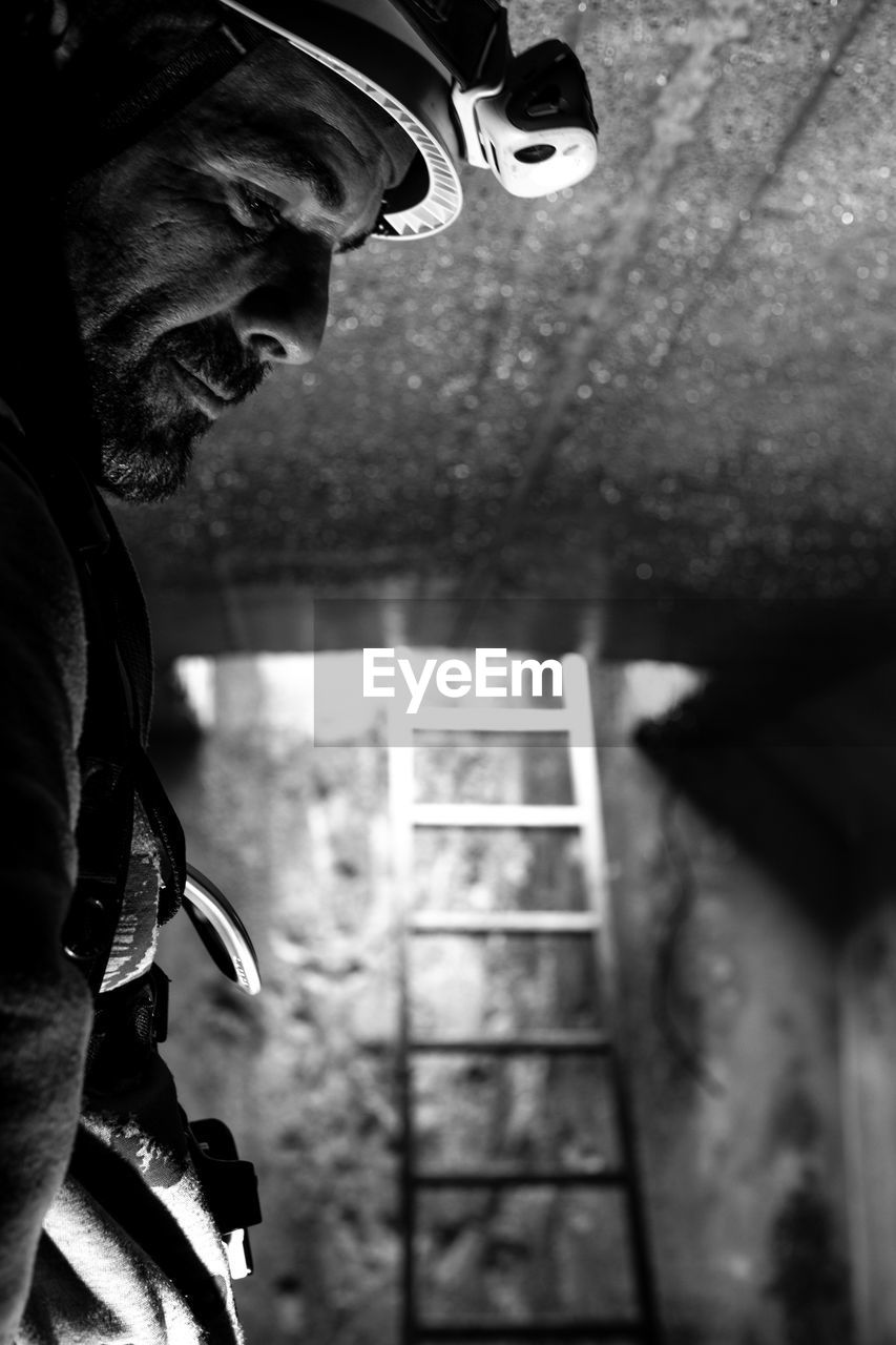 Closeup of a man working in a sewer