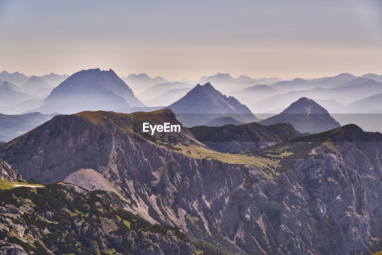 Scenic view of mountains against sky during sunset