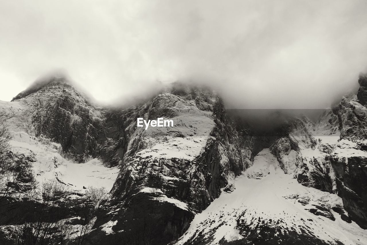 Clouds over mountain range