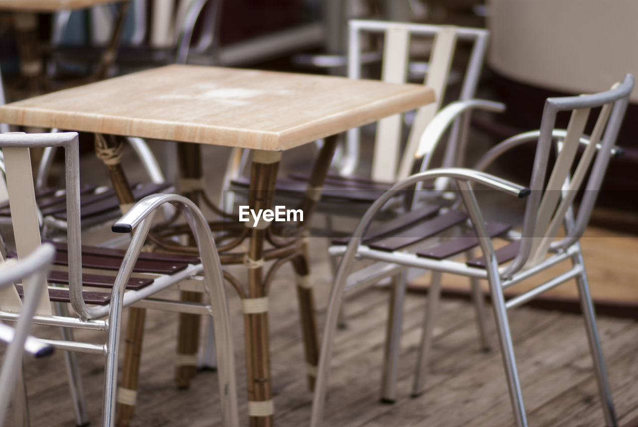 Empty tables and chair at restaurant