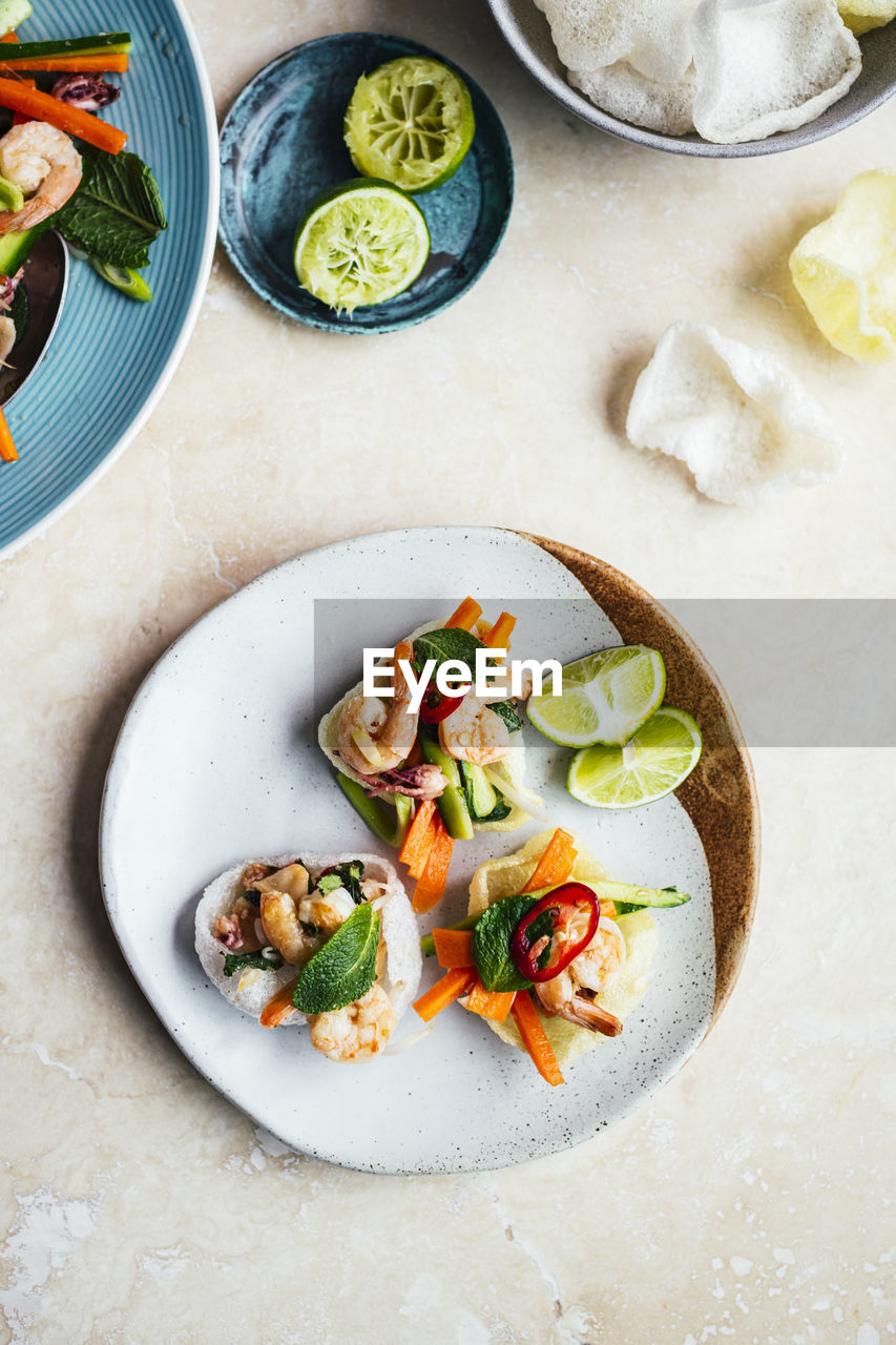 High angle view of prawn salad in plate on table