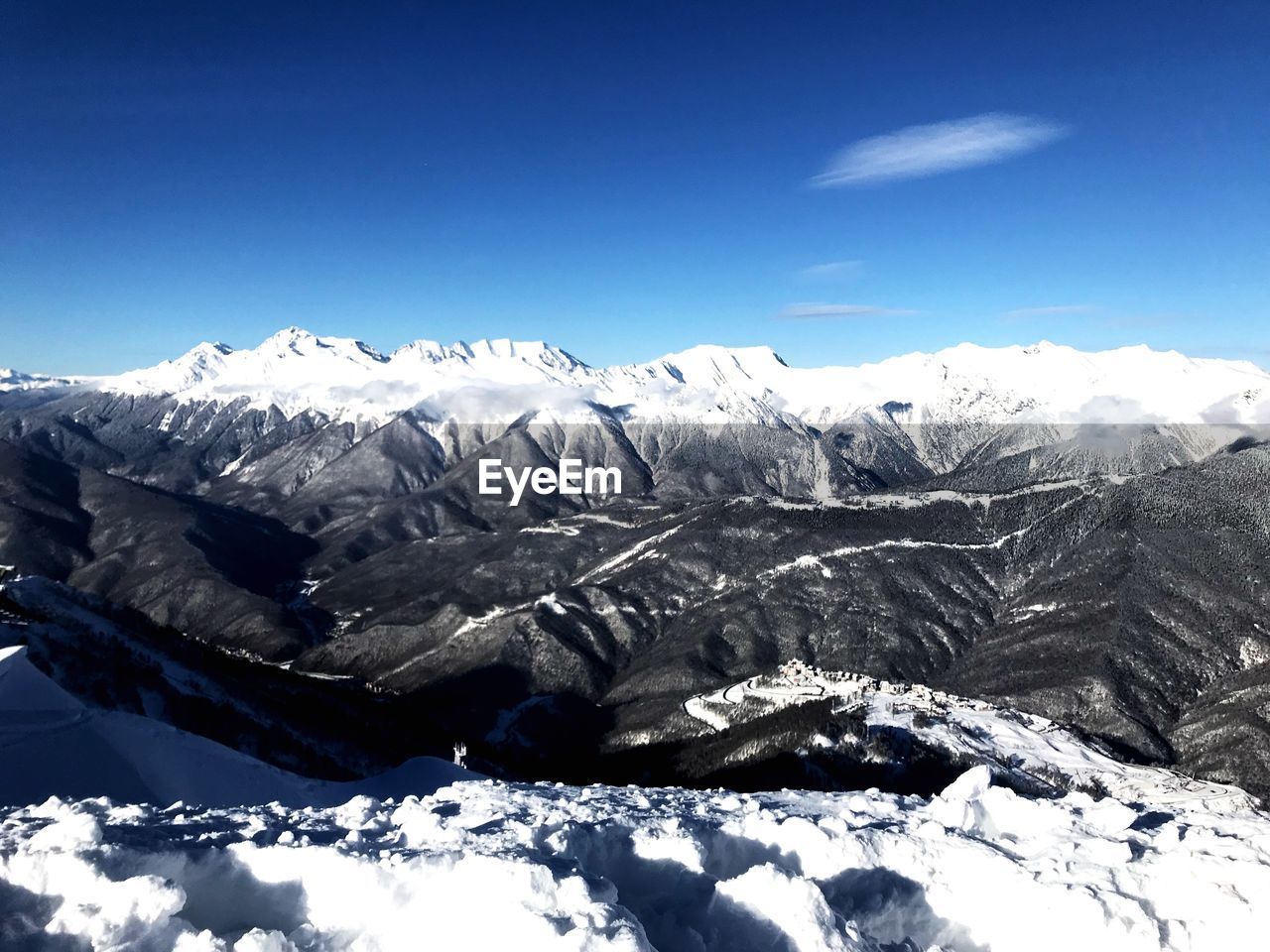 SNOWCAPPED MOUNTAIN AGAINST BLUE SKY