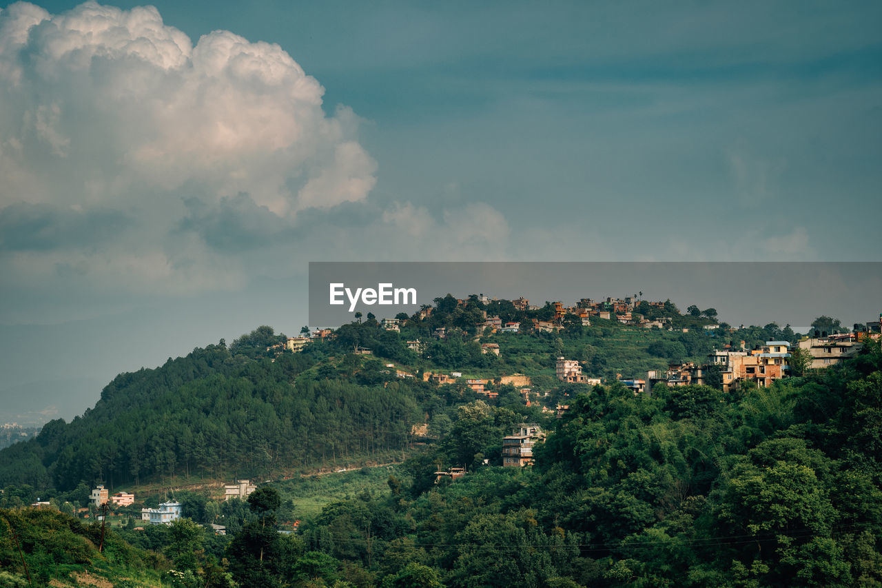 Scenic view of townscape against sky