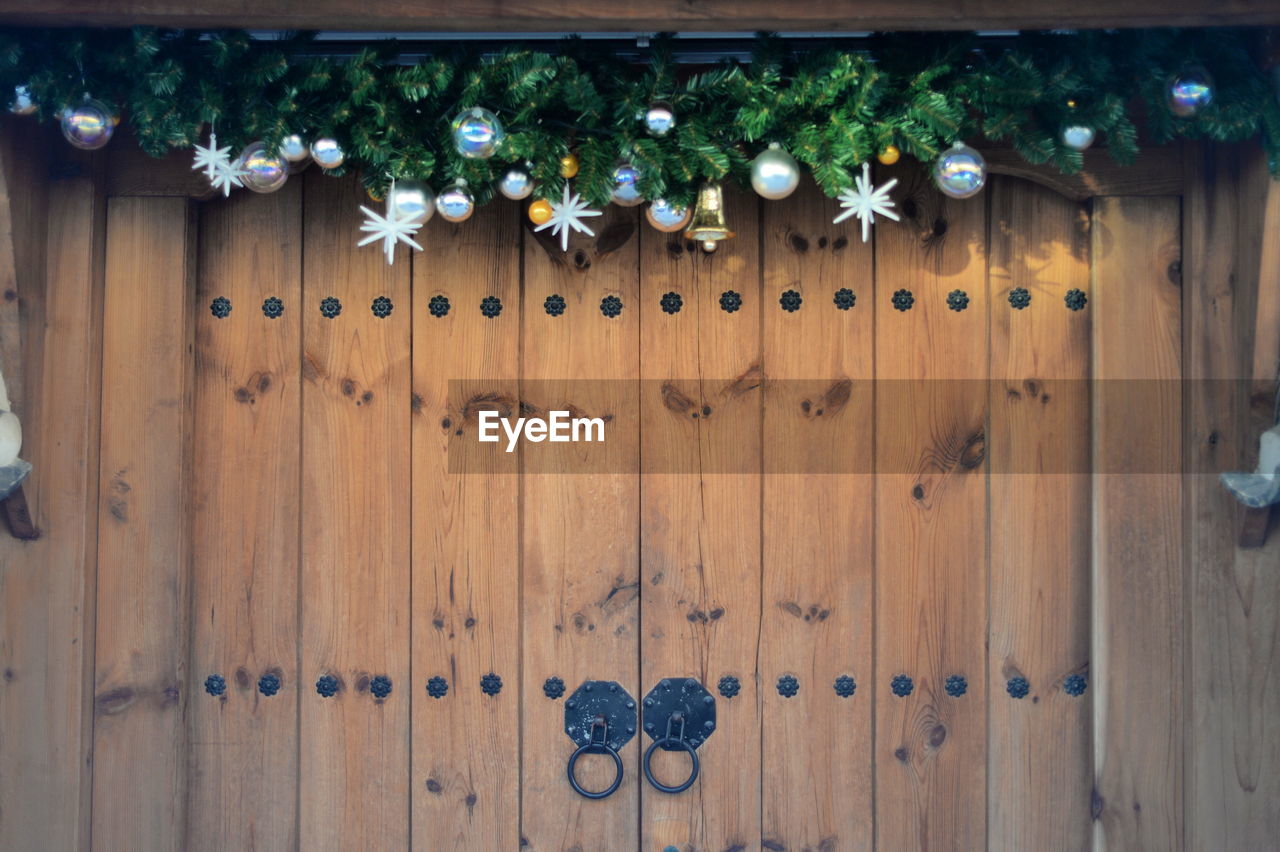 Christmas decorations hanging over front door