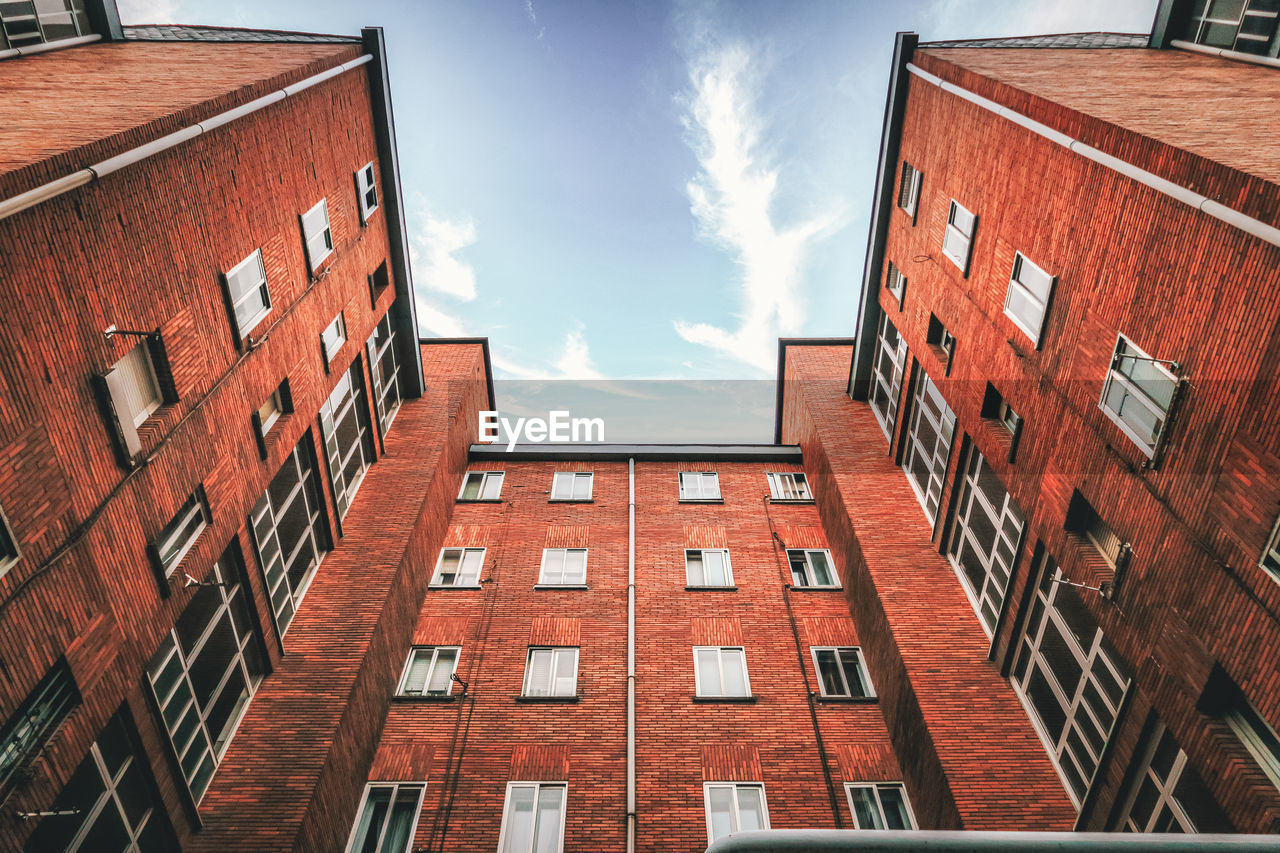 Low angle view of buildings against sky