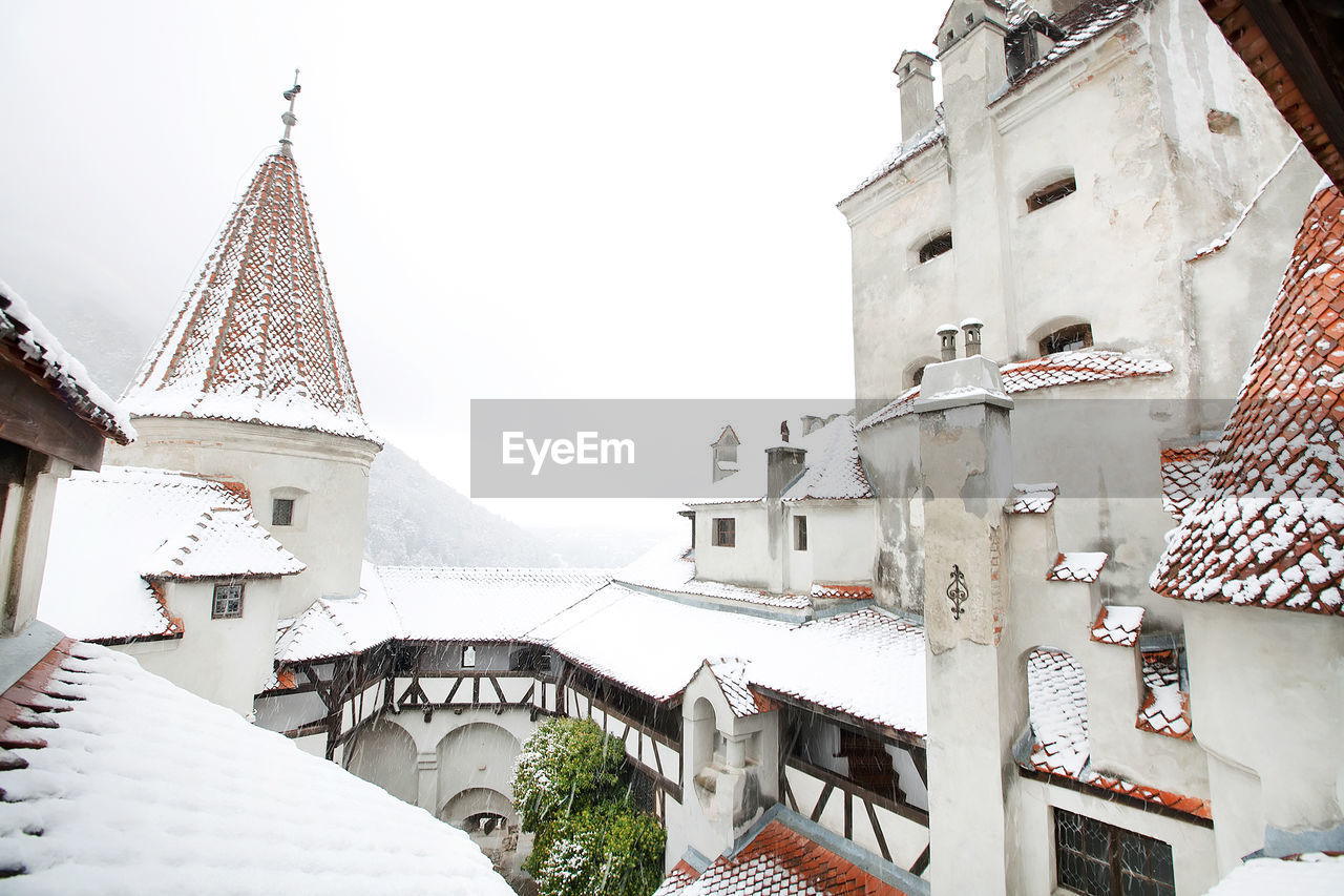 Snow covered bran castle at transylvania