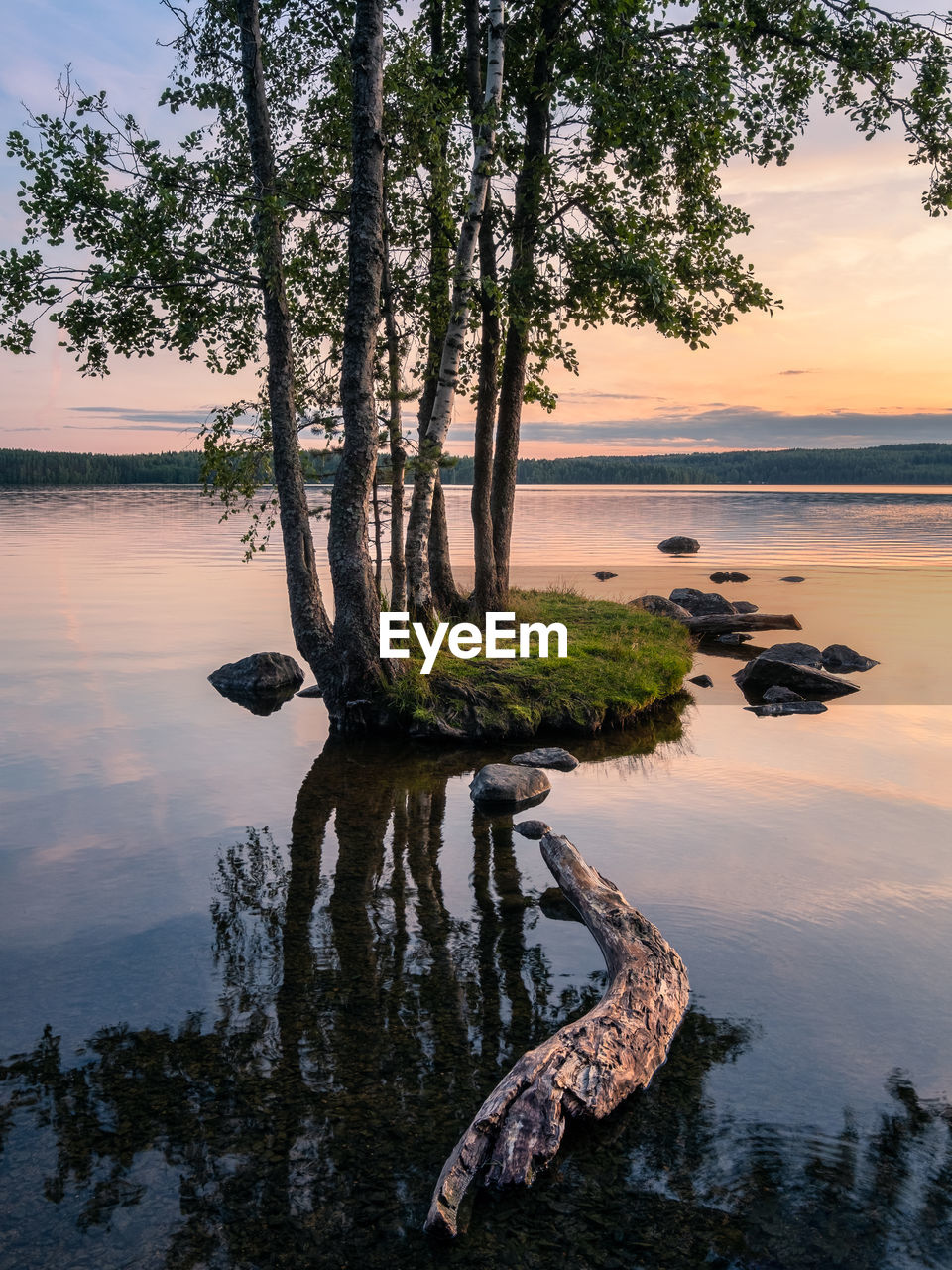 SCENIC VIEW OF LAKE DURING SUNSET