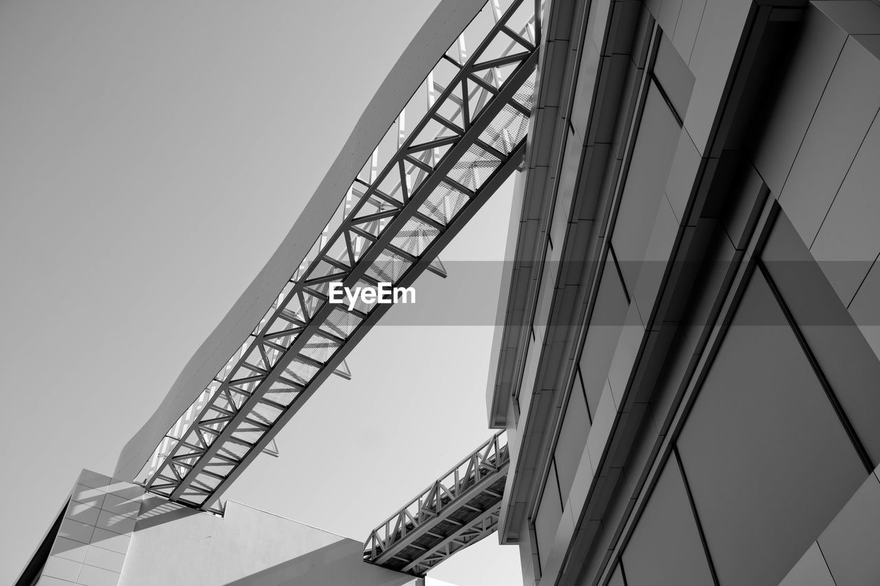 architecture, built structure, black and white, low angle view, sky, line, monochrome, staircase, monochrome photography, building exterior, skyscraper, no people, clear sky, steps and staircases, city, nature, white, industry, day, outdoors, business, metal, business finance and industry