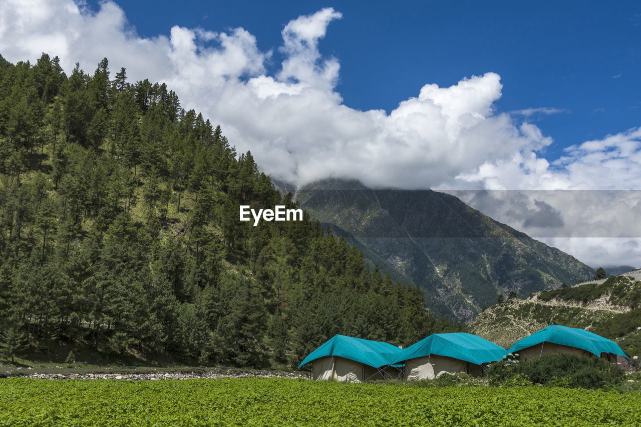 SCENIC VIEW OF MOUNTAIN AGAINST SKY