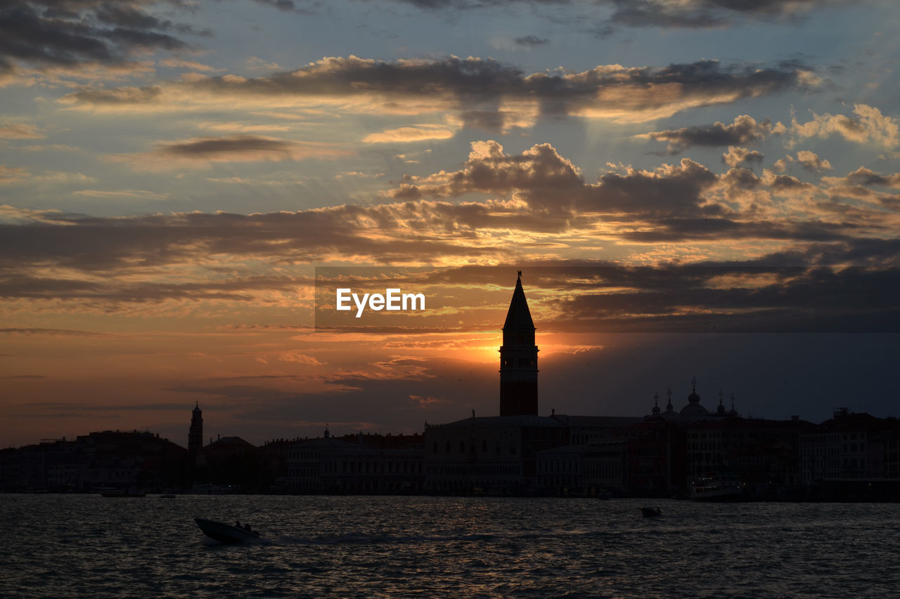 Silhouette of buildings at sunset