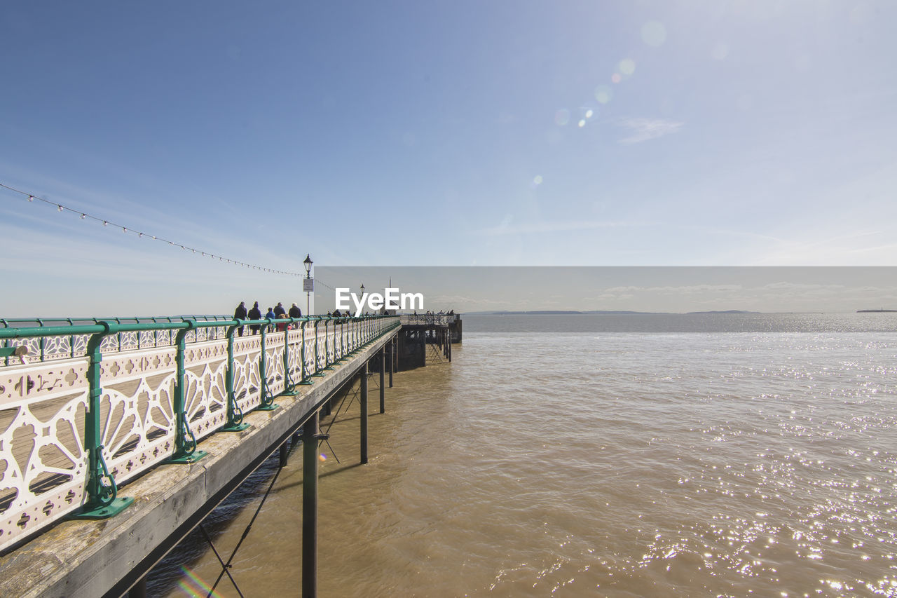 Pier over sea against sky