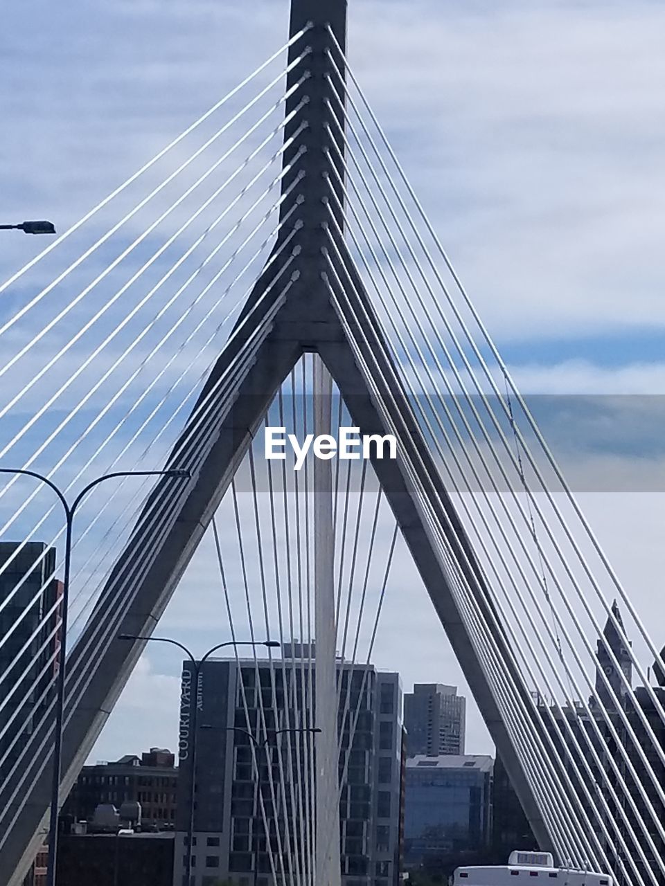 VIEW OF SUSPENSION BRIDGE AGAINST SKY