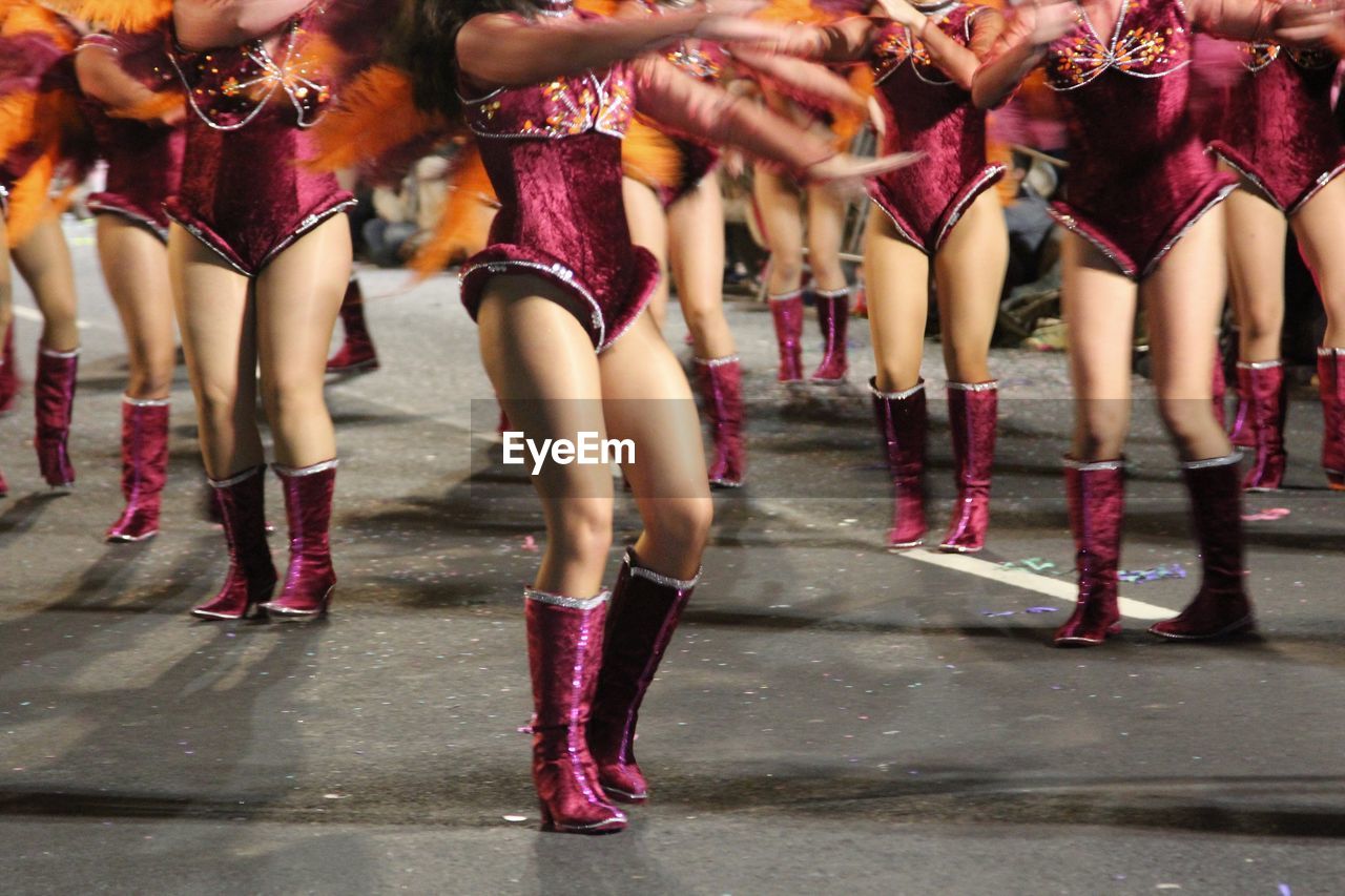 Low section of female performers on street during carnival in madeira