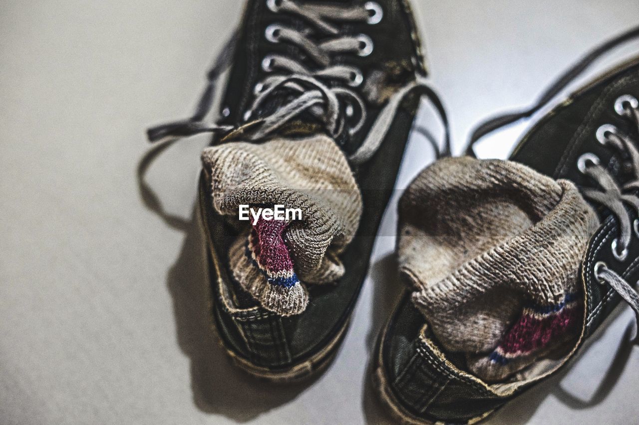 Close-up of shoes on floor