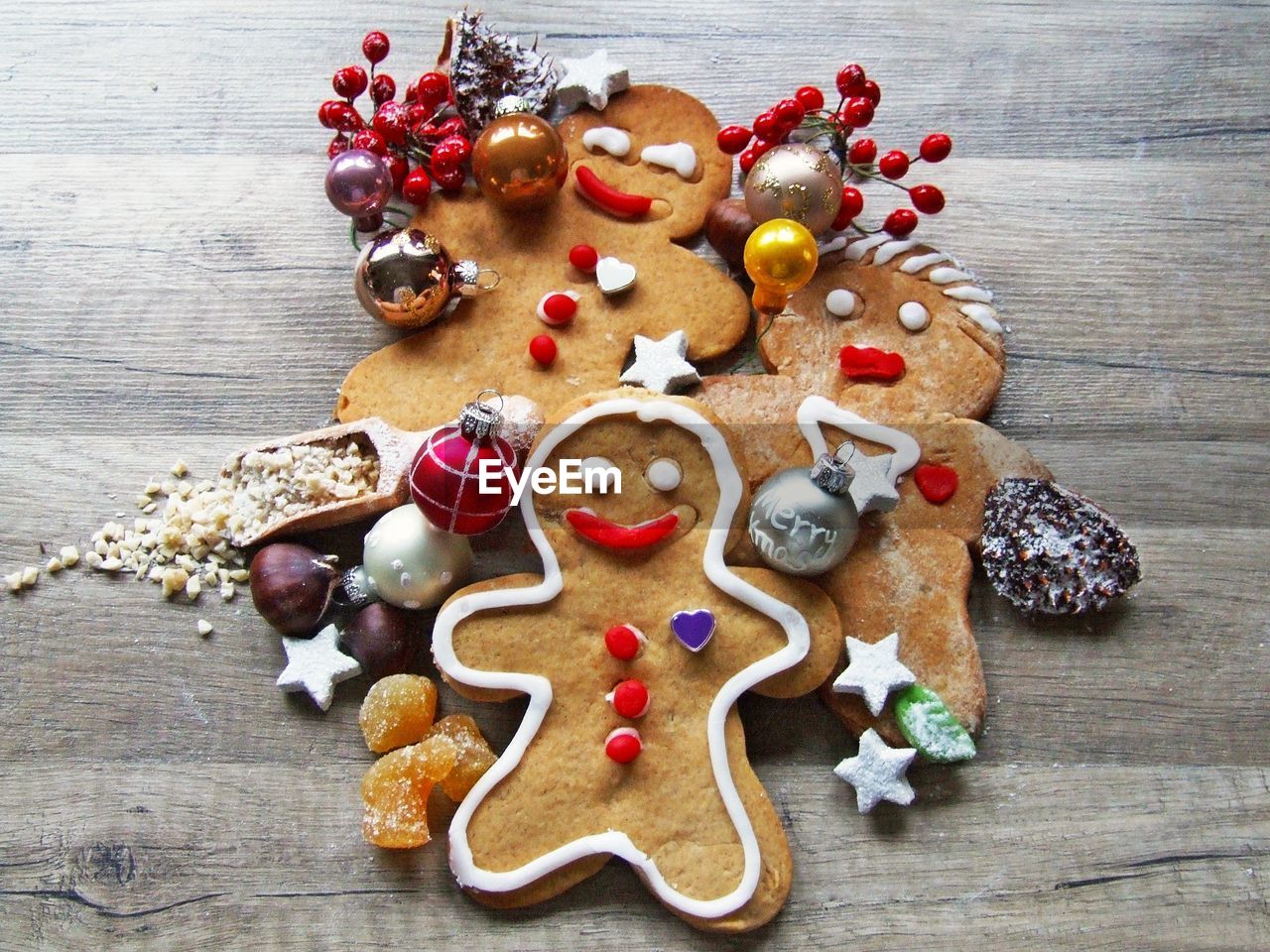 High angle view of christmas cookies and decorations on table