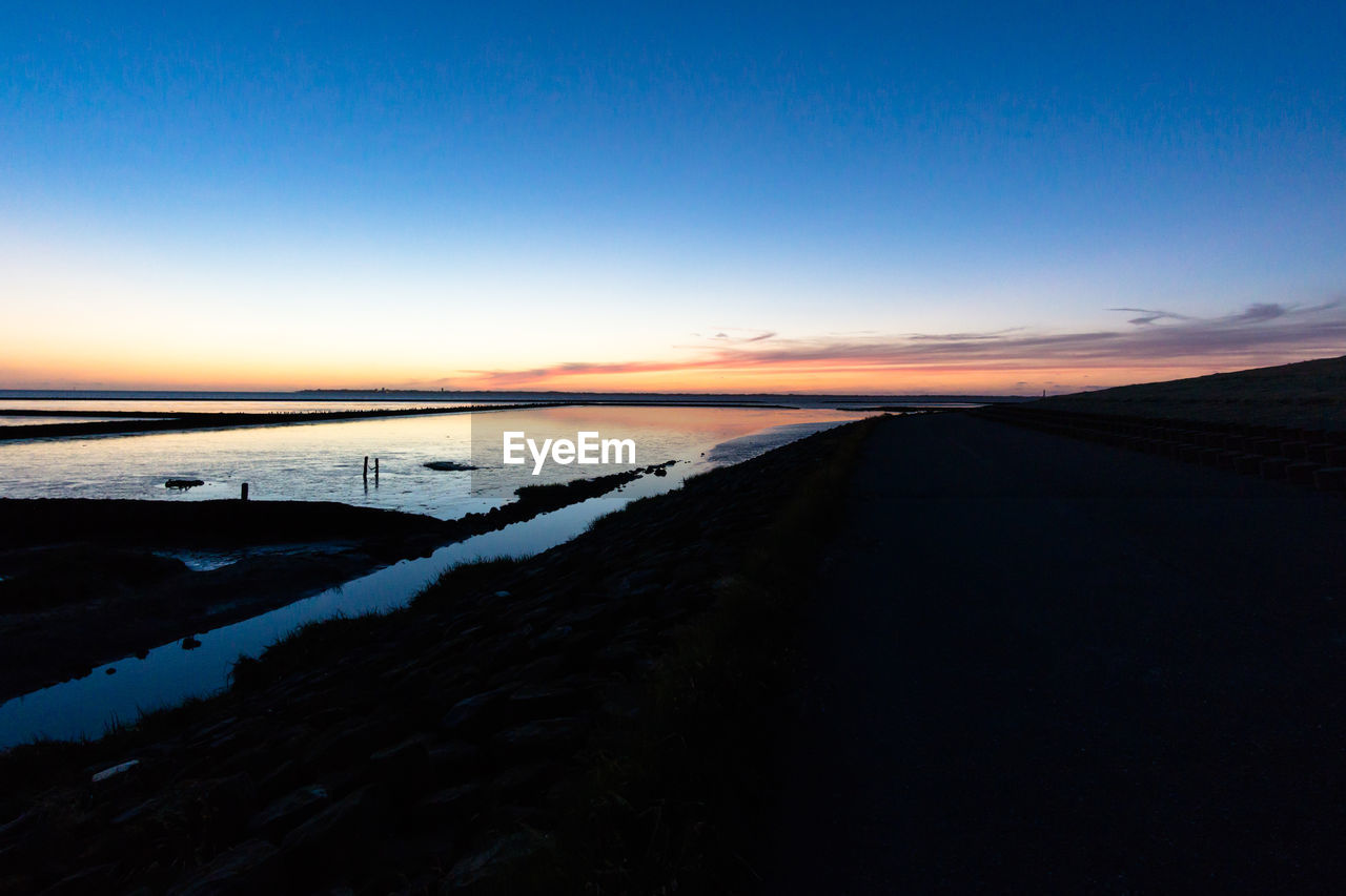 SCENIC VIEW OF LANDSCAPE AGAINST SKY DURING WINTER