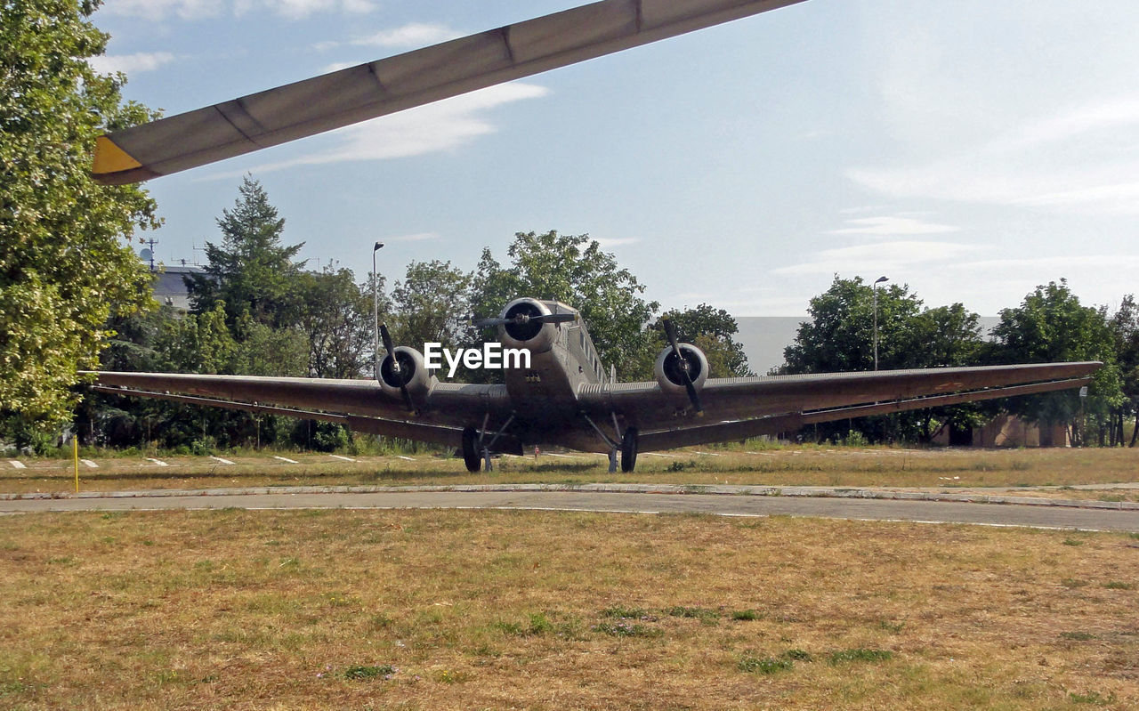 VIEW OF AIRPLANE ON RUNWAY